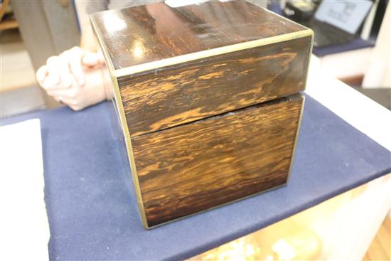 An Aspreys coromandel four-decanter box, fully-fitted, with liqueur glass and retailers label 22 x 22cm